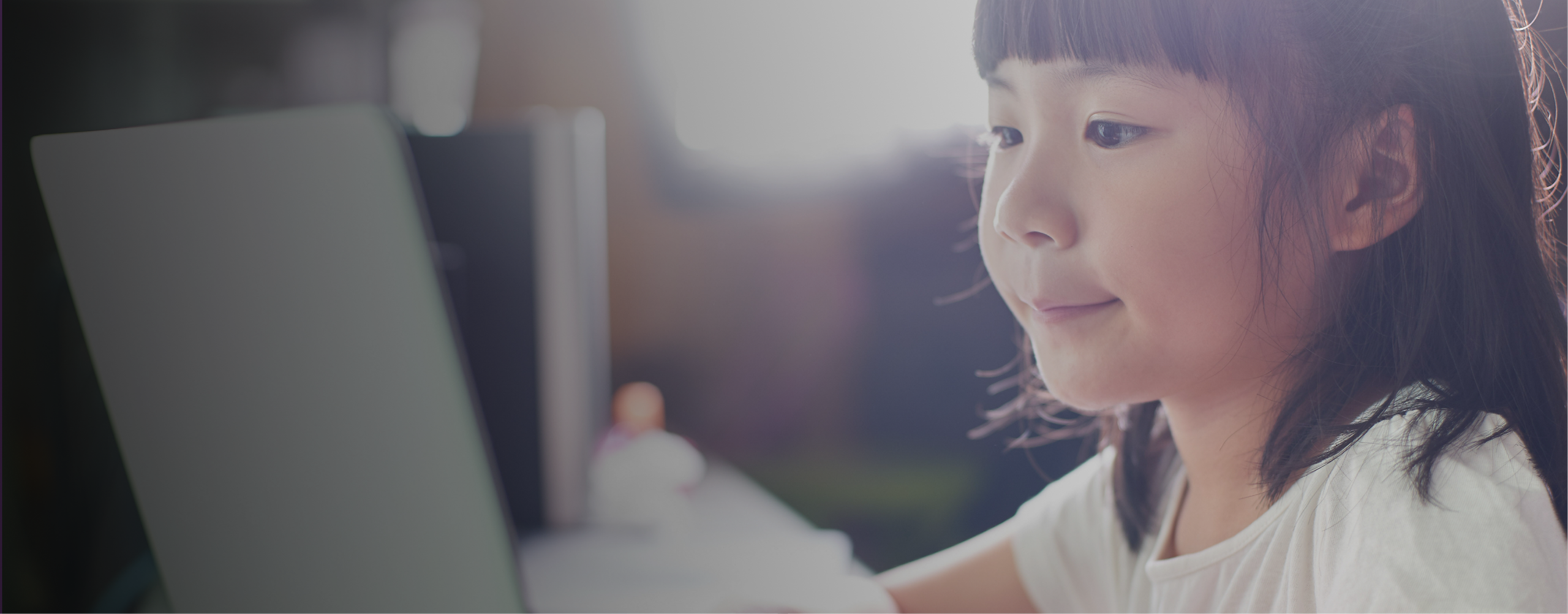 Young student using a computer